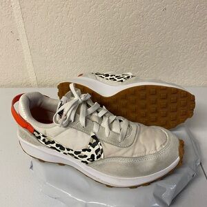 Nike Athletic Shoes with Leopard Print and Orange Accents